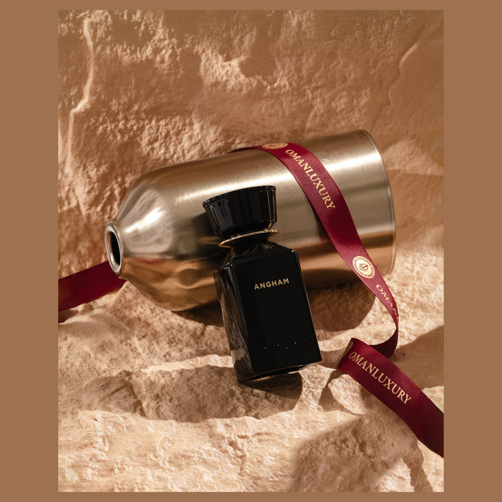 Oman Luxury Angham Eau de Parfum bottle with brushed brass and house ribbon