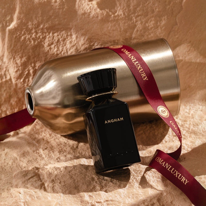 Oman Luxury Angham Eau de Parfum bottle with brushed brass and house ribbon