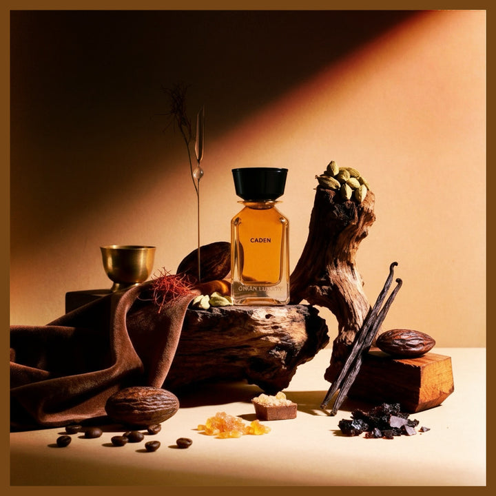 Oman Luxury Caden Eau de Parfum bottle in a still life of spices and vessels