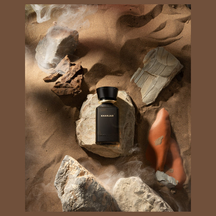 Oman Luxury Khanjar Eau de Parfum bottle on desert rock and sandstone