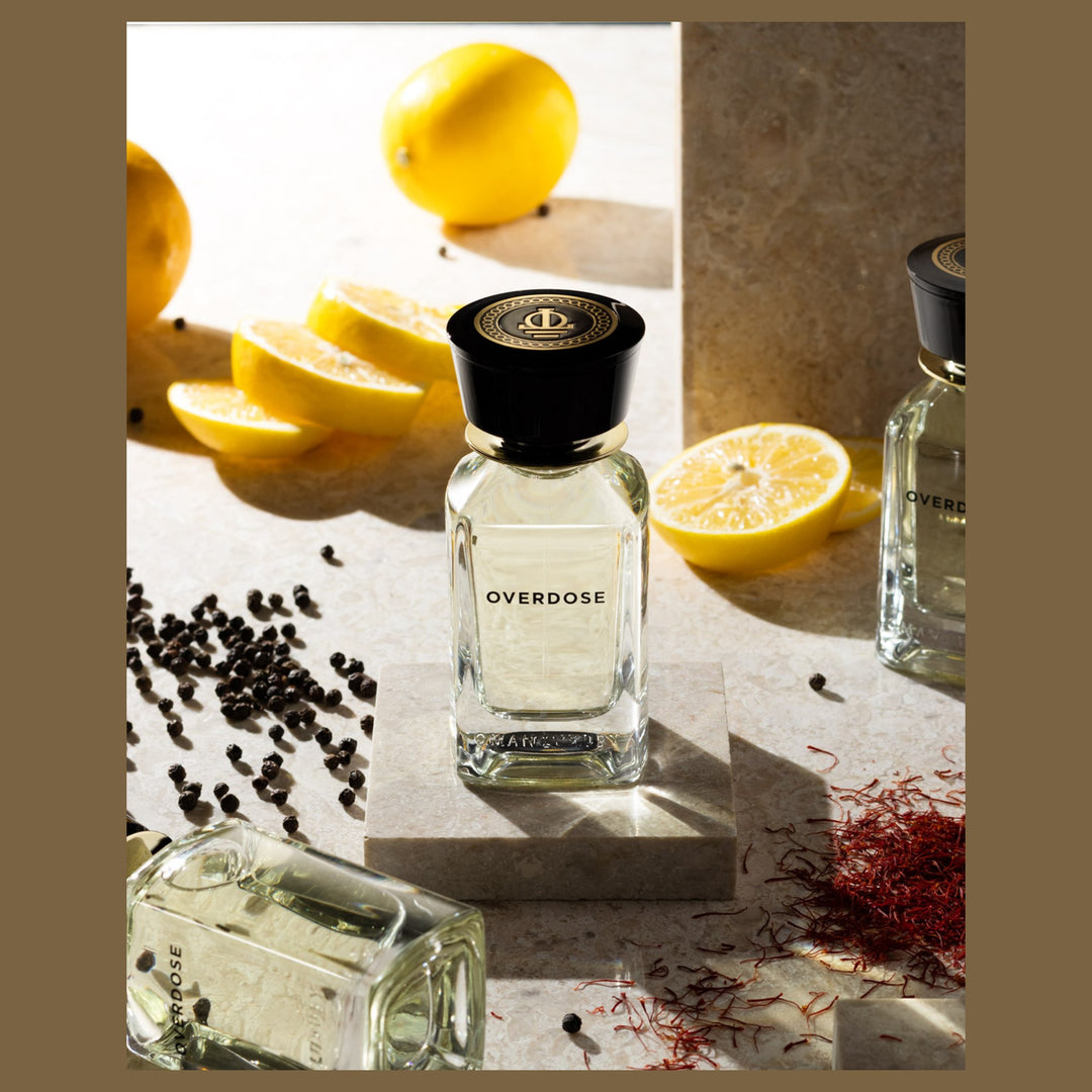 Oman Luxury Overdose Eau de Parfum bottle with cut lemons, saffron and black pepper