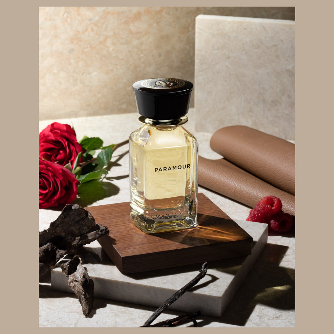 Oman Luxury Paramour Eau de Parfum bottle with red roses and folded leather