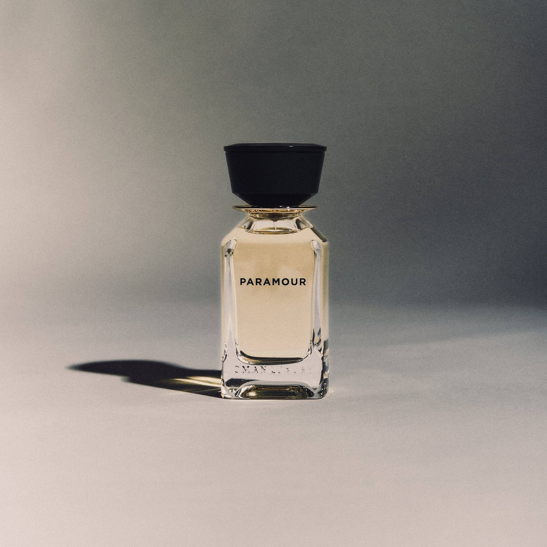 Oman Luxury Paramour Eau de Parfum bottle standing alone on a soft grey studio backdrop