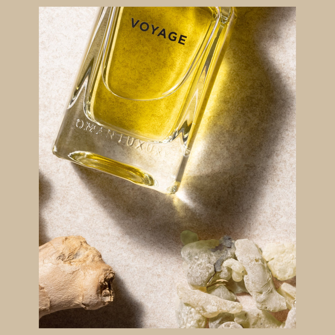 Oman Luxury Voyage Eau de Parfum bottle macro detail beside frankincense tears