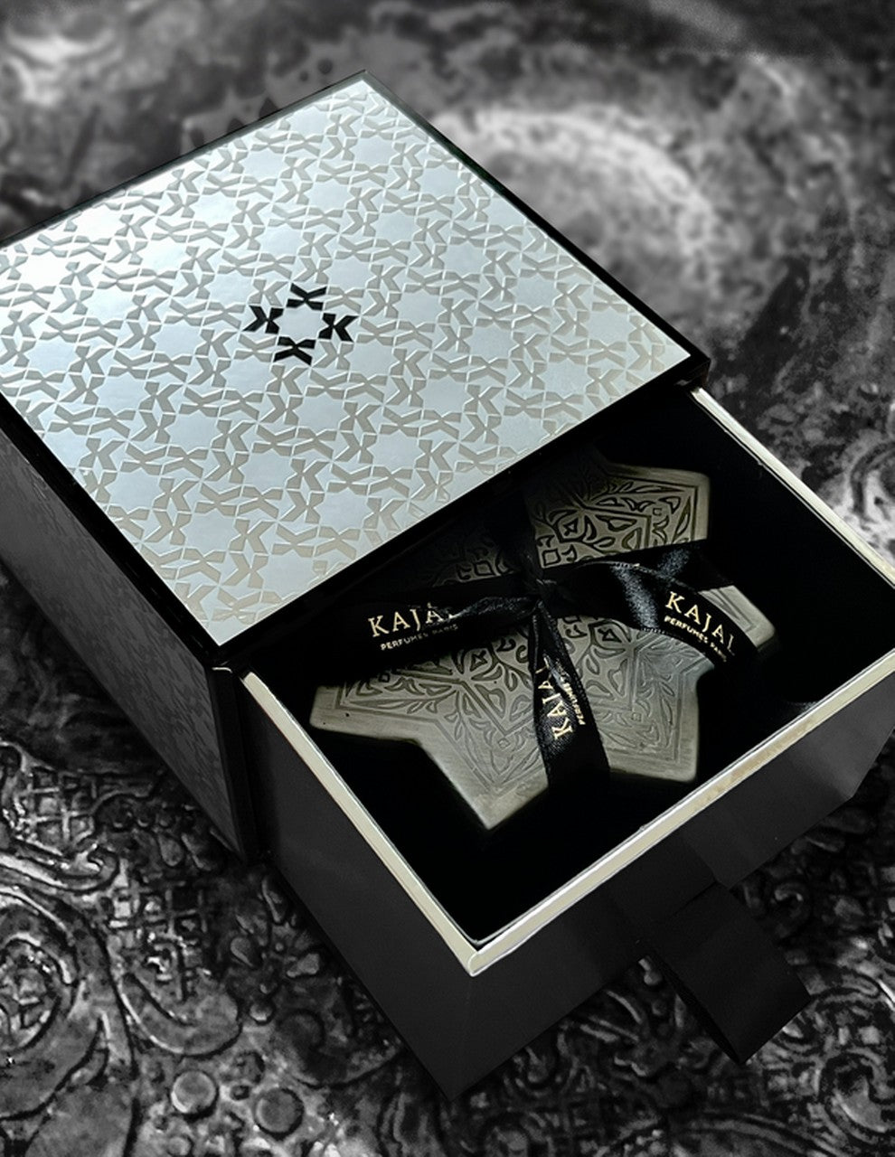 Kajal Treasure Box Silver opened drawer revealing star-shaped flacon tied with silk ribbon